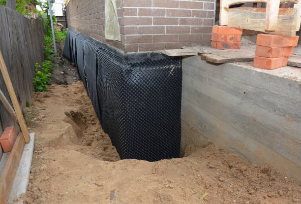 SJ Waterproofing Pros technician performing targeted Waterproofing assessment in Veedersburg, IN
